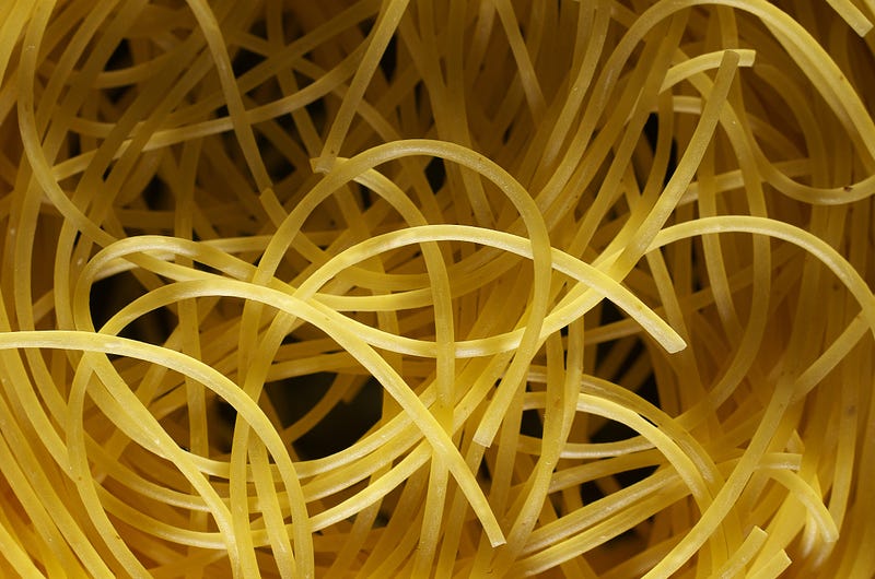 Spaghetti showcasing its long, thin shape