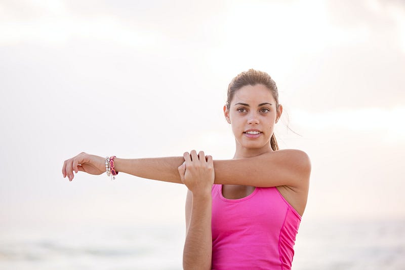 Woman stretching during exercise