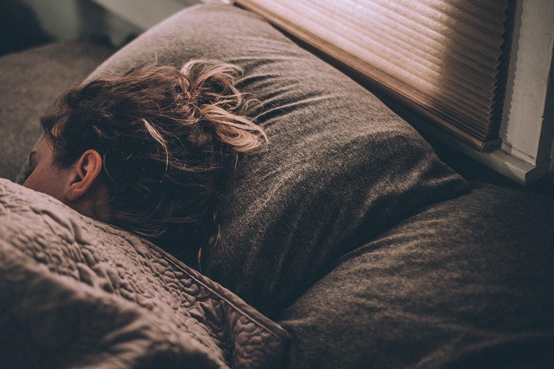 Person enjoying a peaceful sleep