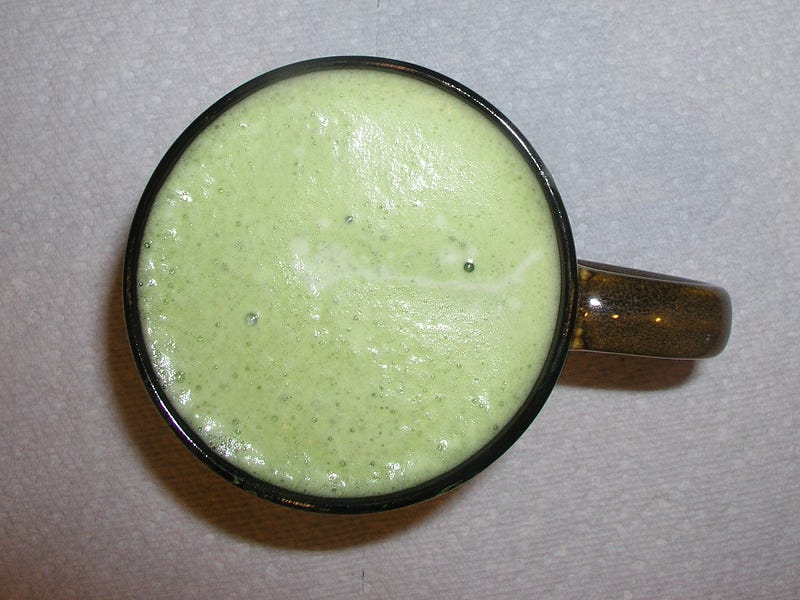 Frothy prepared Matcha tea ready for consumption