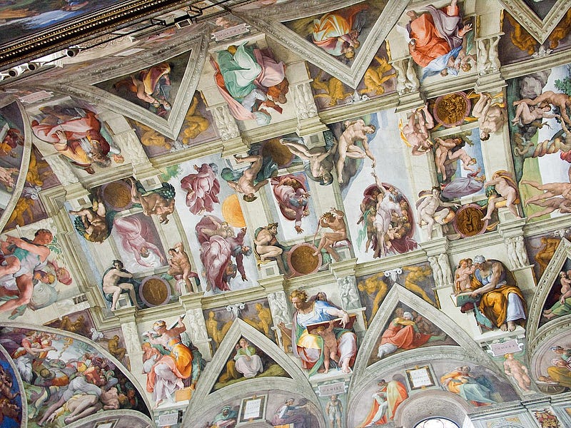 The ceiling of the Sistine Chapel showcasing Michelangelo's work